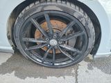a close up of a tire on the side of a car