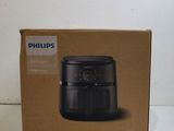 philips air purifier in a box on a white surface
