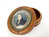 a wooden box with a picture of a man on it