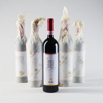 trois bouteilles de vin posées les unes à côté des autres