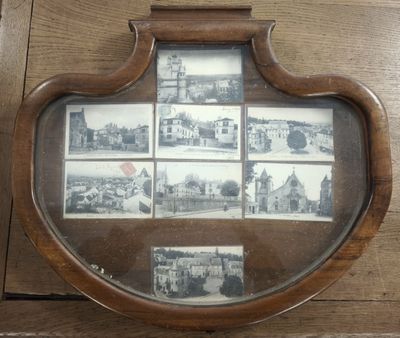 une photo représentant un cadre en bois contenant des photos