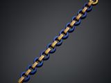 a blue and gold bracelet with a gold clasp