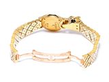 an image of a gold bracelet with a skull on it