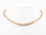 a gold necklace on a mannequin mannequin mannequin mannequin mannequin mannequin mannequin mannequin mannequin