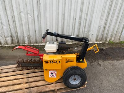 an image of a small machine that is sitting on a pallet