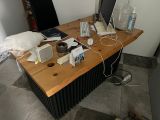 a desk with a computer and a laptop on it