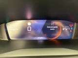 a digital display on the dashboard of a car