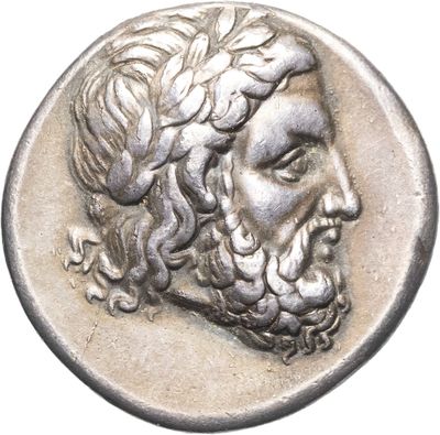a close up of a coin with a man ' s face on it