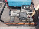 an image of a small engine on a cart