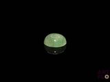 l'image d'un objet vert et noir dans l'obscurité