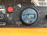 a close up of a control panel on a construction vehicle