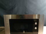 a microwave that is sitting on a table