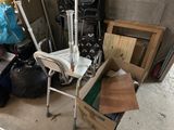 a chair that is sitting in a room with a lot of stuff