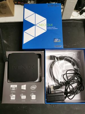 an image of a box with a remote and a charger in it