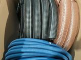 a box with a bunch of hoses inside of it