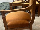 a lot of chairs that are sitting in a room