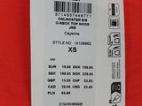 a red shirt with a price tag attached to it