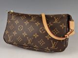 louis vuitton monogram canvas wrist bag