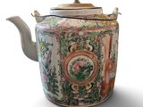 a tea pot with a lid on a white background