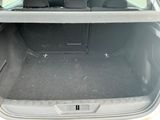 a trunk of a car with the back seats folded down