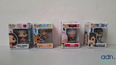 three funko pop vinyl figures are lined up on a table