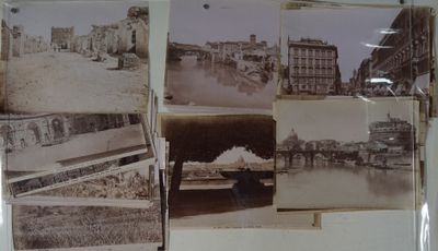 many old photos hanging on the wall of this room