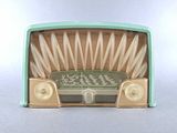 an old fashioned radio that is sitting on a table