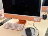 a computer on a desk with a keyboard and mouse