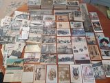 a table with a lot of old photos on it