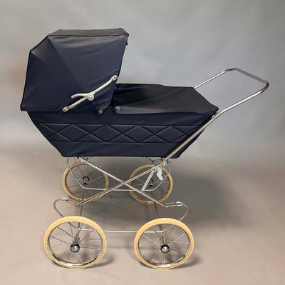 an image of a baby stroller with a blue cover