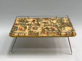a small tray with a pattern on it on a table