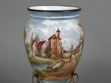 a vase with a painting on it sitting on a stand