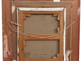 an old picture frame with a picture of a man and a woman