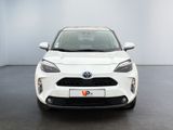 the front view of a white toyota c - hr parked in a room