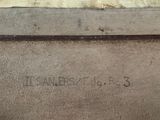 a large book on the ground with writing on it