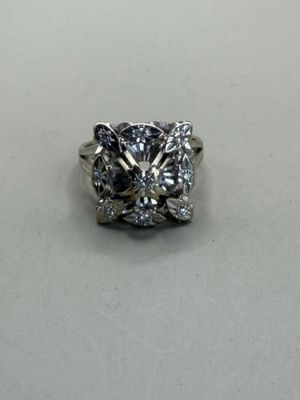 an image of a diamond ring on a table