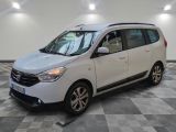 a picture of a small white van parked in a garage
