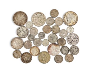 an image of a pile of old coins on a white surface