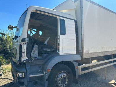 a truck that is parked on the side of the road