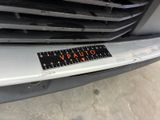 a sticker on the front of a car that says vato