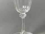 a wine glass that is sitting on a table