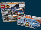 two legos that are in a box on a blue background