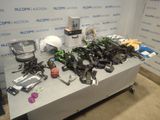 a table with a bunch of items on it in front of a wall