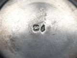 a close up of a metal object with a hole in it