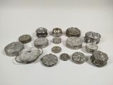 several different types of buttons are arranged on a white surface