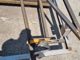 a pile of metal and wood sitting on the ground
