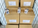 several boxes are stacked on top of each other in a shopping cart