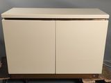 an image of a white cabinet sitting on top of a wooden pallet