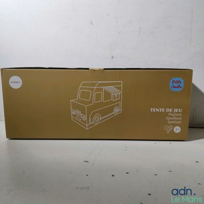 a cardboard box with a picture of a truck on it