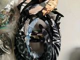 many different types of headbands laid out on a table